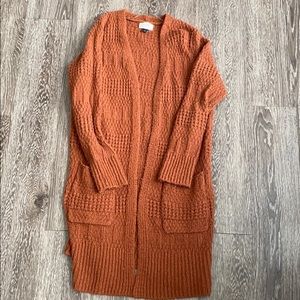orange cardigan
